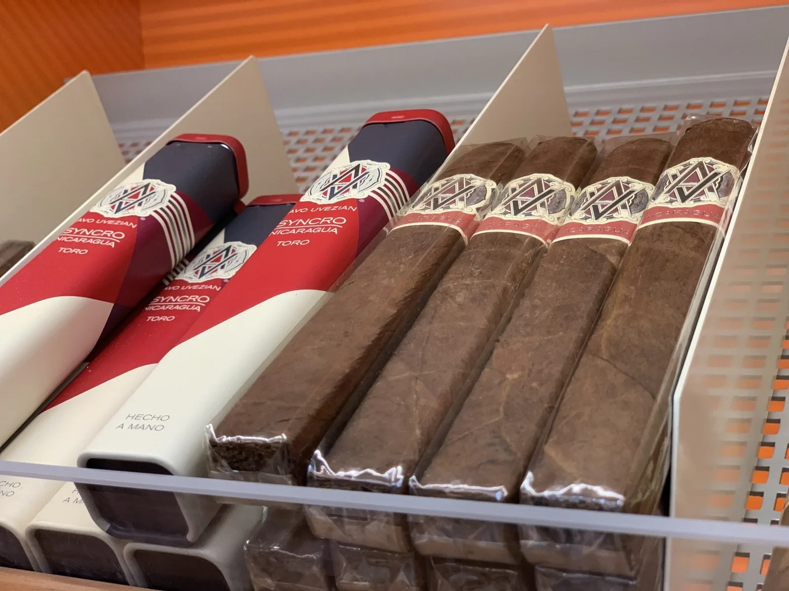 Shelves of premium cigar boxes in the humidor